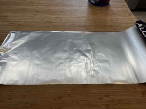 square piece of tin foil to make container out of